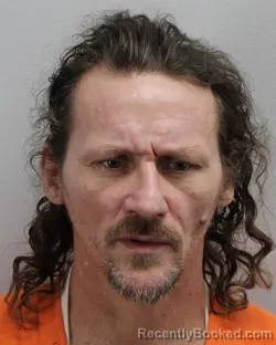 Mugshot of Travis Michael Johnson booked in Virginia Beach County, Virginia on August 12, 2026