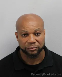 Mugshot of Efa Kwabla Ahelegbe booked in Virginia Beach County, Virginia on August 29, 2026