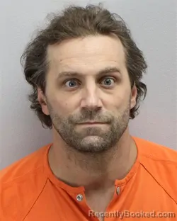 Mugshot of Christopher Aubert Rhodes booked in Virginia Beach County, Virginia on August 30, 2026