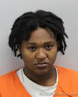 Mugshot of Cornasia Burton booked in Virginia Beach County, Virginia on August 31, 2026