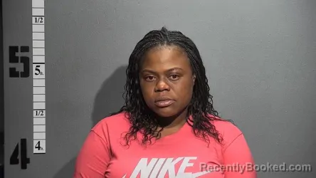 Mugshot of BRITTNEY OUTLAND booked in Suffolk County, Virginia on March 27, 2026