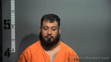 Mugshot of CARLOS ROMERO-FLORES booked in Suffolk County, Virginia on June 15, 2026