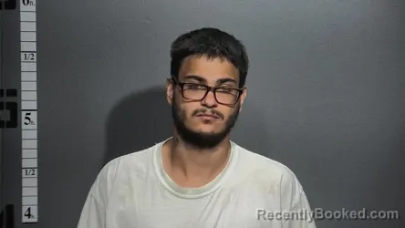 Mugshot of DYLAN JEAN booked in Suffolk County, Virginia on April 28, 2026