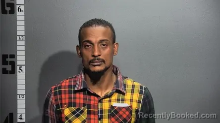 Mugshot of GREGORY MERRICK BURKE booked in Suffolk County, Virginia on May 20, 2026