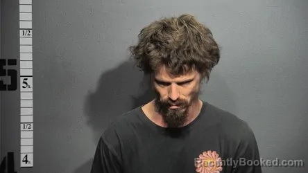 Mugshot of John Earl Grimes booked in Suffolk County, Virginia on October 8, 2026