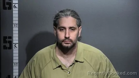 Mugshot of JORDAN BRADY MANSOUR booked in Suffolk County, Virginia on April 1, 2026