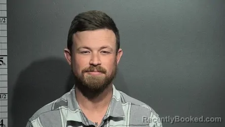 Mugshot of JUSTIN TATEM