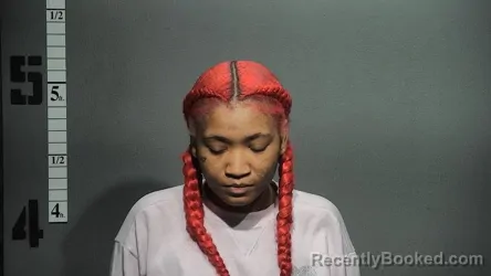 Mugshot of JAYNIA MARIE UZZLE booked in Suffolk County, Virginia on March 6, 2026