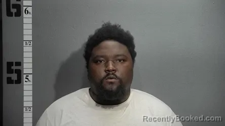 Mugshot of OMAR QUAMINE HOLLIMAN booked in Suffolk County, Virginia on March 6, 2026