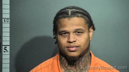 Mugshot of RAQUAN MALIKE HOLMES booked in Suffolk County, Virginia on August 3, 2026