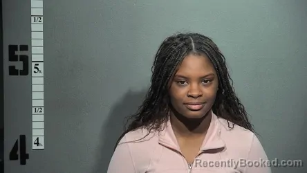 Mugshot of TYESHA MELANIE HARRISON booked in Suffolk County, Virginia on March 27, 2026