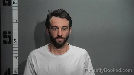 Mugshot of TYLER JOSEPH HORTON booked in Suffolk County, Virginia on April 2, 2026