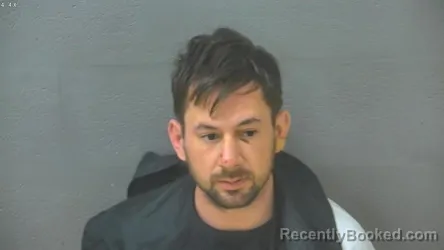 Mugshot of ADAM MICHAEL CAUGHHORN