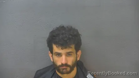 Mugshot of Besart Ajvazi Cooper booked in Lynchburg County, Virginia on August 7, 2026