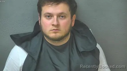 Mugshot of DANE JOSEPH REICHARD