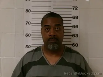 Mugshot of KIM OLIVER MOORE booked in Henderson County, Texas on March 22, 2026