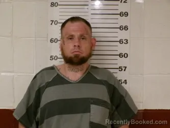 Mugshot of JUSTIN LEE WAKEHAM booked in Henderson County, Texas on March 24, 2026