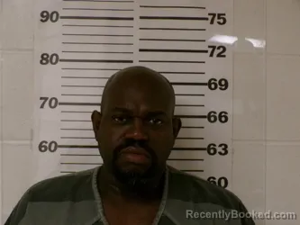 Mugshot of JONATHAN LAMONT SIMMONS booked in Henderson County, Texas on March 27, 2026