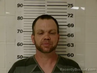 Mugshot of JOHN TRAVIS DAVIS booked in Henderson County, Texas on April 2, 2026