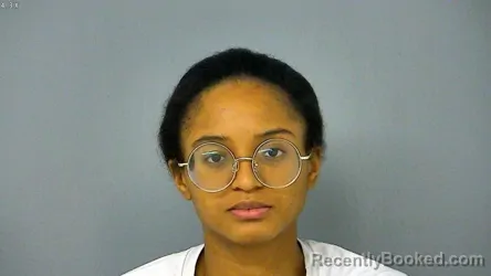 Mugshot of Alexis Ruth Ann Spencer booked in Poquoson County, Virginia on August 6, 2026
