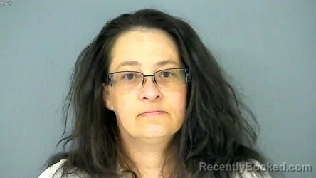 Mugshot of MICHELLE AMY ROCK booked in Poquoson County, Virginia on April 3, 2026