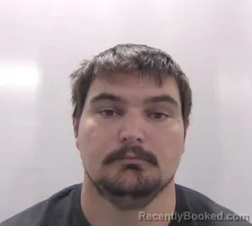 Mugshot of Melvin Alton Junior Harrell