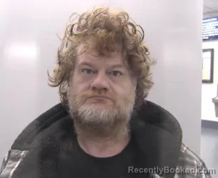 Mugshot of Robert Duayne Plunkett