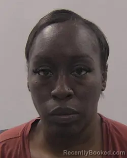 Mugshot of Chimyra Shawnta Tomilson booked in Chesapeake County, Virginia on April 30, 2026