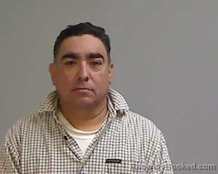 Mugshot of GUSTAVO GARZA