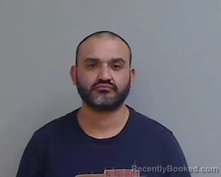 Mugshot of HECTOR MANUEL JIMENEZ