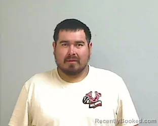 Mugshot of REYNALDO ADAN CARBAJAL