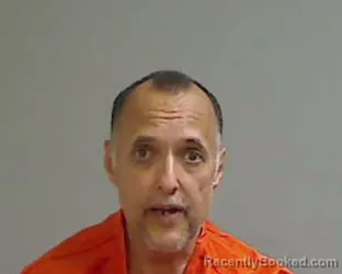 Mugshot of ADRIAN HUGO REQUENES