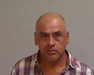 Mugshot of SANTOS RODRIGUEZ