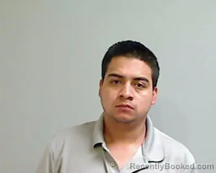 Mugshot of EMMANUEL BUSTOS booked in Hidalgo County, Texas on April 19, 2026