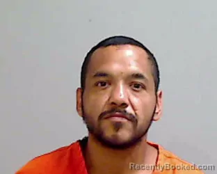 Mugshot of Adrian Jesus Flores booked in Hidalgo County, Texas on April 15, 2026