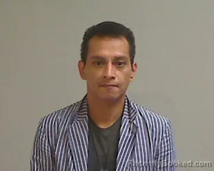 Mugshot of ENRIQUE JR AREVALO TORRES booked in Hidalgo County, Texas on July 14, 2026
