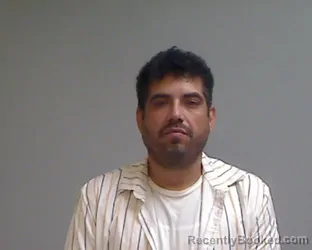 Mugshot of GODFREY BEY MORENO booked in Hidalgo County, Texas on July 14, 2026