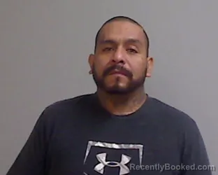 Mugshot of Omar Trini Bustos booked in Hidalgo County, Texas on August 25, 2026