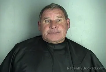 Mugshot of CLARENCE RUSSELL HUGHES