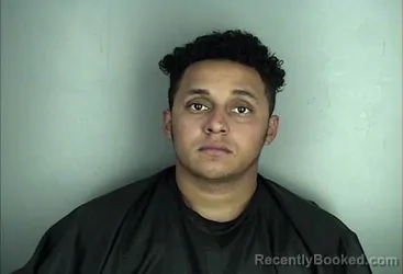 Mugshot of MAYCOLL JONATHAN RIVERA-ZUNIGA booked in Greenwood County, South Carolina on April 10, 2026