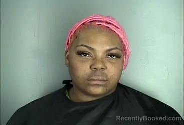 Mugshot of PURSIA NATIA REIDOUT