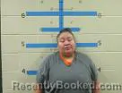 Mugshot of Crystal Brings Him Back booked in Oglala Lakota County, South Dakota on August 4, 2026