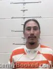 Mugshot of KELLY LEE GRASS booked in Oglala Lakota County, South Dakota on April 30, 2026