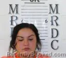 Mugshot of MIKAELA REDDY booked in Oglala Lakota County, South Dakota on May 1, 2026