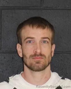 Mugshot of JUSTIN EUGENE MARONEY