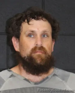 Mugshot of DUSTIN ROSS MOORE booked in Hopkins County, Texas on April 1, 2026