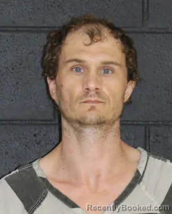 Mugshot of JUSTIN WADE OVERLY booked in Hopkins County, Texas on April 28, 2026