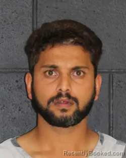 Mugshot of Arjun Bhattarai booked in Hopkins County, Texas on August 8, 2026