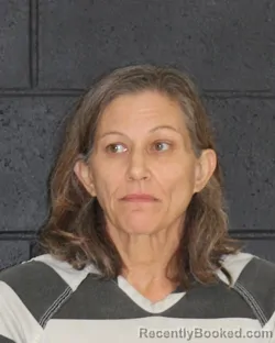 Mugshot of Heather Lee Dayton Caver booked in Hopkins County, Texas on October 8, 2026
