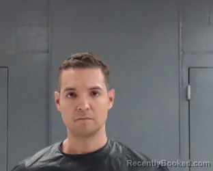 Mugshot of Christopher Adrian Corales booked in Hunt County, Texas on August 14, 2026